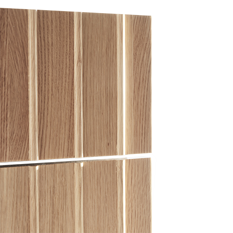 Close-up corner detail of Isla Porter's Drea cabinet door style in "East Oak" wood finish